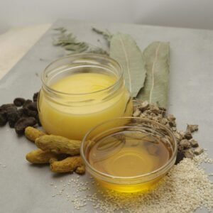 Natural ingredients including bay leaves and oils arranged on a white background for culinary use.
