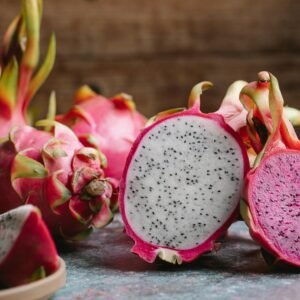 Vibrant dragon fruits displayed in a close-up showcasing their unique texture and color.